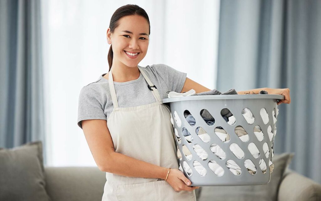 housekeeper-with-laundry-basket